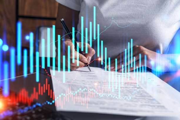 Woman signs agreement. Forex financil market chart and graph hologram. Double exposure . Brokerage concept.