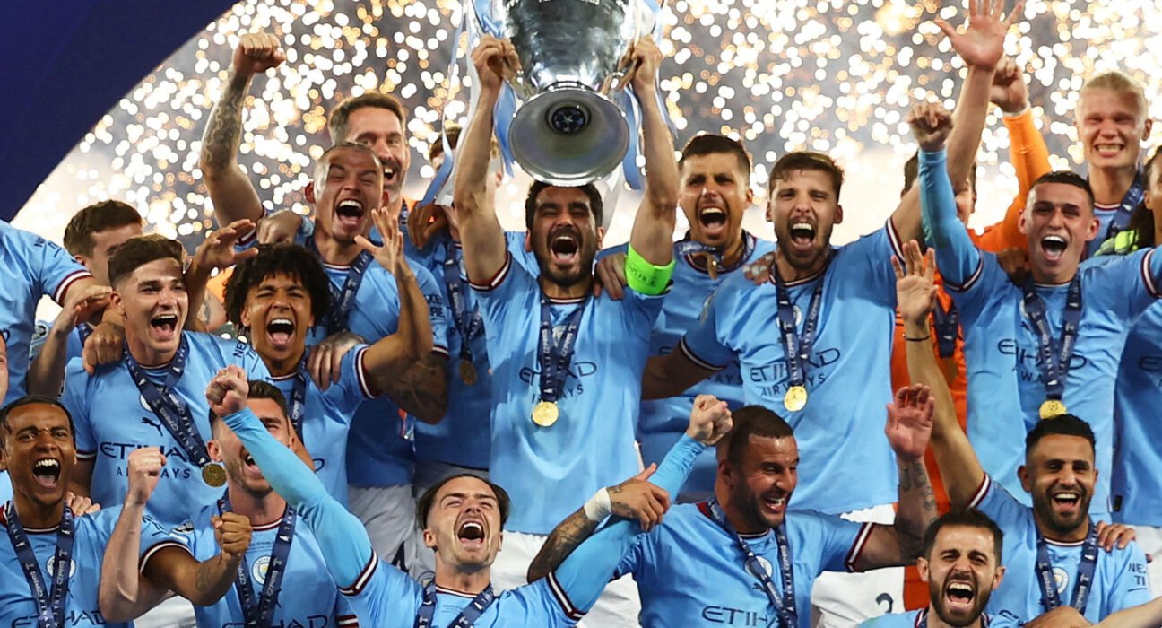 FILE PHOTO: Soccer Football - Champions League Final - Manchester City v Inter Milan - Ataturk Olympic Stadium, Istanbul, Turkey - June 11, 2023 Manchester City's Ilkay Gundogan lifts the trophy as he celebrates with teammates after winning the Champions League REUTERS/Molly Darlington